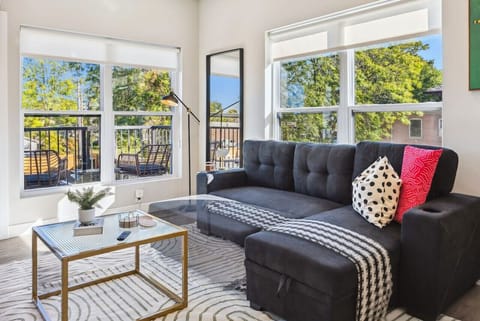 As you take a seat in the living room, the comfortable furniture and tasteful design make it easy to unwind.