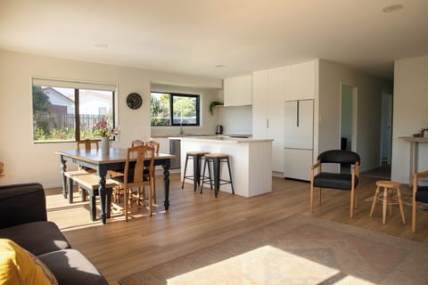 Sunny open plan kitchen, dinning and lounge