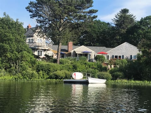 Chatham waterfront setting showcasing the home’s deck & private lake frontage.