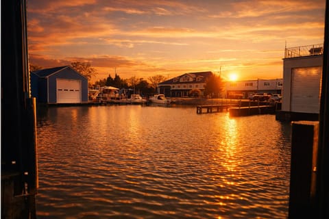 Peaceful Harbor at Sunset
End your day with a breathtaking view of boats and waterfront homes, all under a colorful Lake Erie sunset sky.

