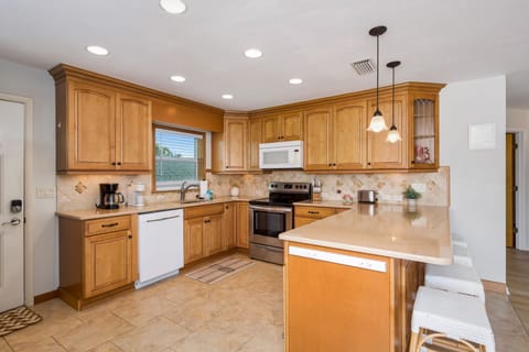 Charming coastal kitchen equipped with everything you need.