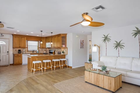 Bright and breezy layout with a breakfast bar that brings everyone together.