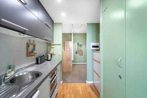 Prepare quick snacks in the compact kitchenette equipped with an oven, microwave, and dishwasher before heading out to explore.