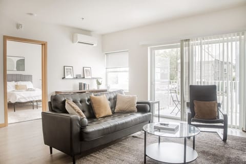 Spacious living room with private balcony