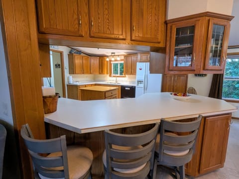 Additional counter seating for kitchen, dining, and living room.