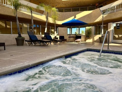 Sink into the bubbling hot tub and melt stress away.