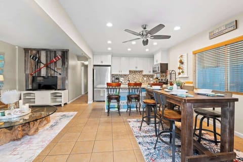 Modern, Beachy, and Open-Space Living Room and Kitchen.  Perfect for Gatherings of Family and Friends 