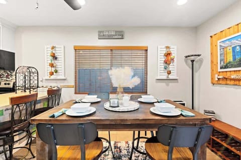 4 Seats at Dining Table and 4 Seats at Bar.  Modern Beachy Design