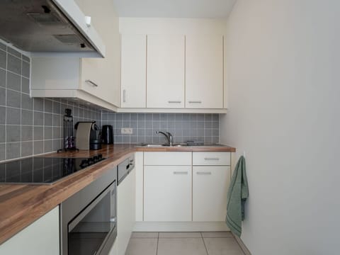 Countertop, Kitchen, Cabinetry, Flooring, Interior Design, Kitchen Appliance, Major Appliance, Wood, Floor, Sink