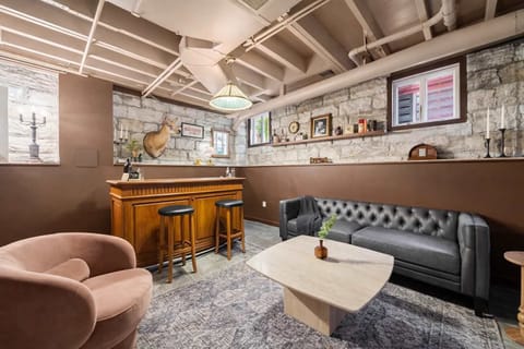 Bar: Mix up your favorite drinks at this unique and stylish bar area, perfect for evening relaxation. (Alcohol shown for display only and is not for guest consumption.)