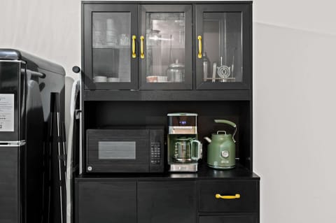 Kitchenette: Enjoy the fridge, microwave oven, coffee maker and water kettle.