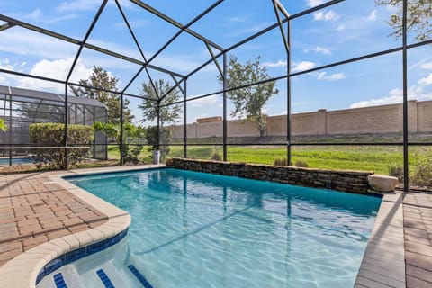 Spacious patio with private pool and loungers — enjoy the Florida sun 