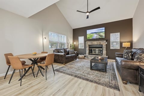 Gather around the open-concept living room with comfortable seating for the whole group