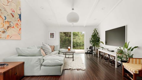 Stylish living room with large smart TV