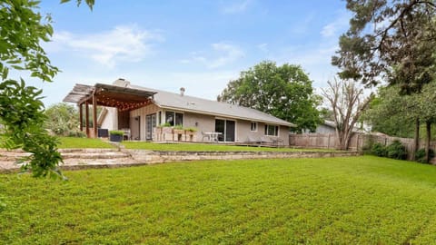 4 Bedroom Home Exterior and Lush Garden