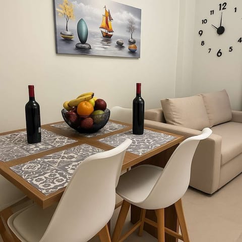 Elegant Dining Corner – Set for wine and perfect for a cozy meal.

