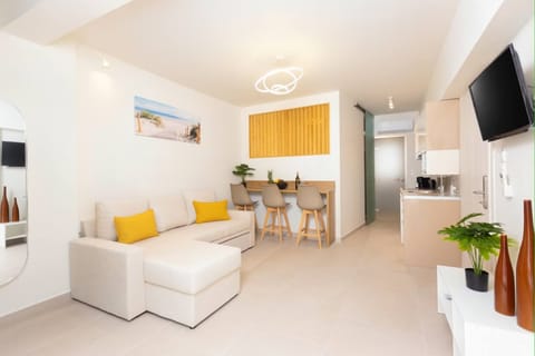 Bright Open-Plan Living Area – Comfortable seating with modern decor and ambient lighting.