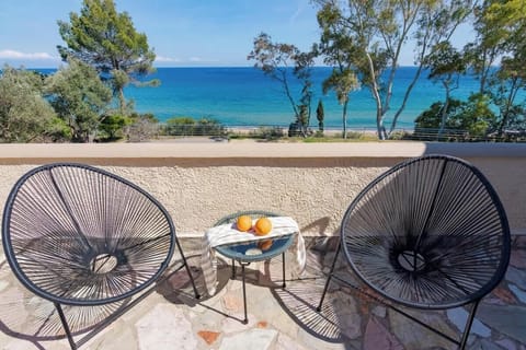 Seafront Balcony with Wine and Uninterrupted Blue Horizon
Relax with a glass of wine on your private balcony overlooking the endless sea — a perfect spot for slow mornings or golden sunsets.