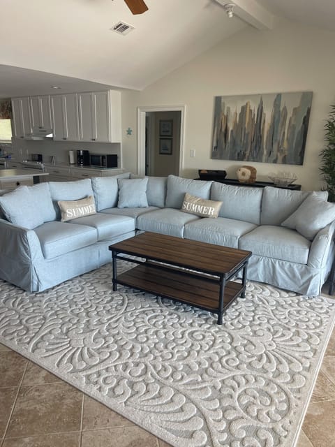 Living Room open to sun room and kitchen