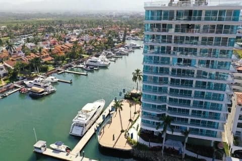The Nautico condo building is located right on the marina and near restaurants/bars, shopping, golf & activities