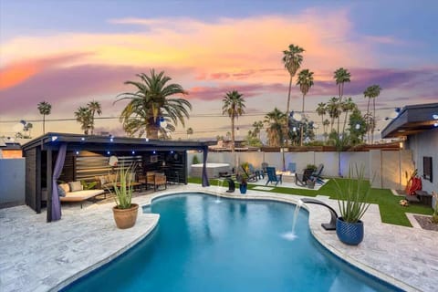 Relax by the pool with stunning sunset views, perfect for unwinding.