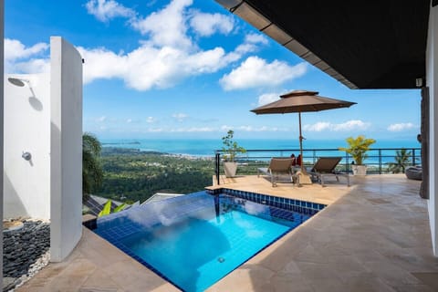 Private swimming pool with sun loungers and ocean views at Villa SKY, Nathon Paradise Village, Koh Samui
