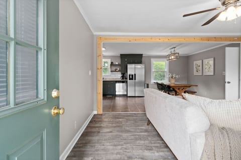 Enter into a spacious, welcoming home with open sightlines from front to back.