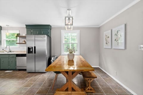 Gather around this farmhouse-style table with room for everyone.