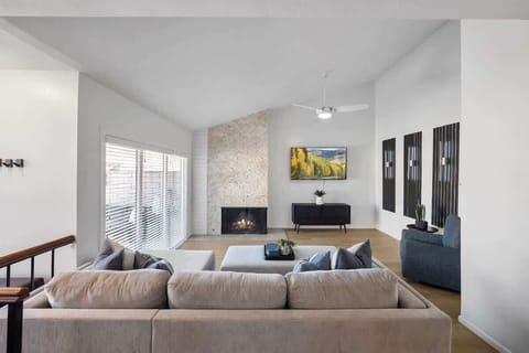 Living Room: Cozy space with comfy seating and TV, perfect for relaxing moments.
