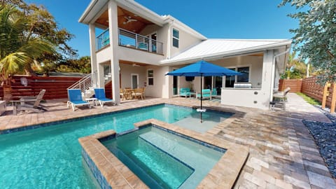 Lounge by the pool and hot tub