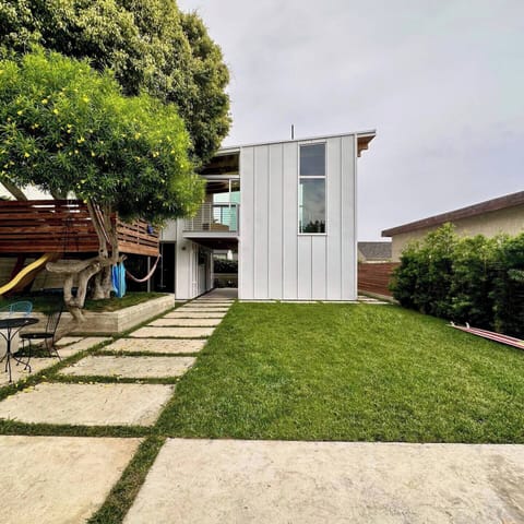 Backyard and treehouse area