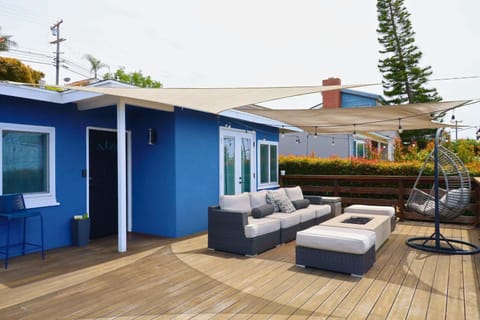 A spacious wooden deck with breathtaking views is ideal for morning coffee or sunset relaxation. Outdoor deck, scenic views, vacation rental with patio, outdoor space, private balcony, sunset views, nature escape, relaxation spot, wooden terrace, c