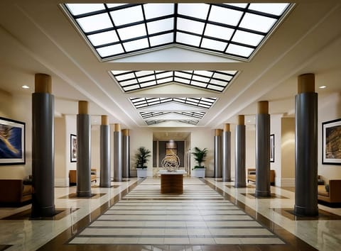 Arrive to a grand, skylit lobby that feels instantly upscale.