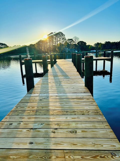 Enjoy the gorgeous sunset over the water on the new dock on the river