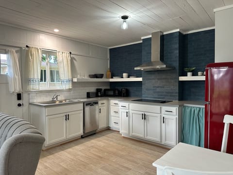 Full kitchen with a compact dishwasher, air fryer but no oven