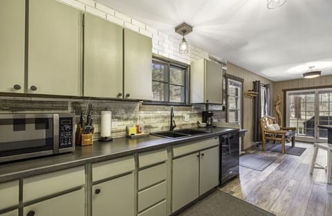 Updated kitchen with ample workspace and cupboards