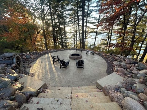 Watch the eagles soar overhead from the fire pit overlooking Lake Menomin.