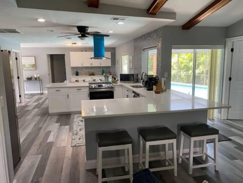 View to kitchen and dining room from living room
