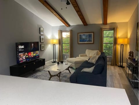 Living Room with 60" Smart TV / Breakfast counter