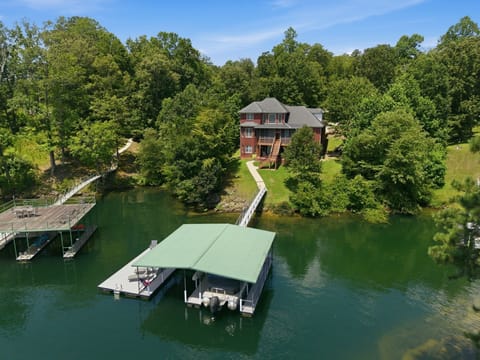 Double slip boat dock (owner’s boat on lift in one slip not for guest use)
