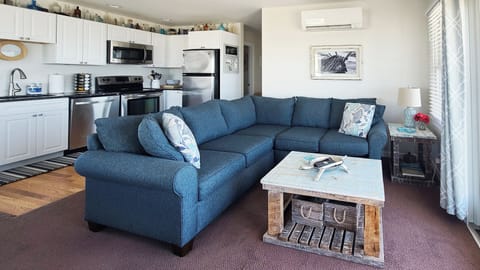 Living room with kitchen beyond