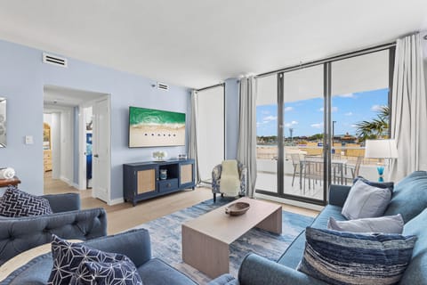 Step into comfort, breathe in the views. - This bright and coastal living space was designed with you in mind — from the cozy seating to the floor-to-ceiling windows that bring Destin’s beauty right to your doorstep. Whether you're sipping coffee on the balcony or unwinding after a day on the water, this is your place to relax, recharge, and truly feel at home on the Emerald Coast.