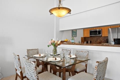 Step into a dining dream where safari-chic chairs meet golden-glow chandeliers and tropical blooms whisper aloha    GCH-120