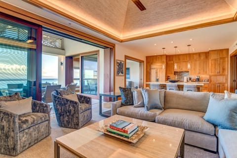    A living room where ceiling fans twirl like palm leaves and rattan baskets secretly store your beachy treasures MON-6401