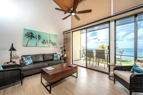 Lounge in style with tropical touches, open skies, and a lanai just steps away from waves and salty breezes NAP-C43