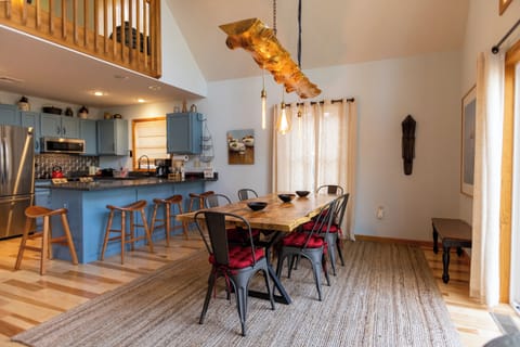 Inviting dining table set for cozy mountain dinners.