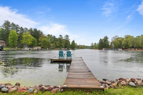 The lake is calling—and it’s just steps from your private dock.