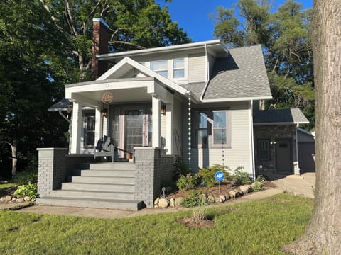 Entrance door on the right, off the driveway.