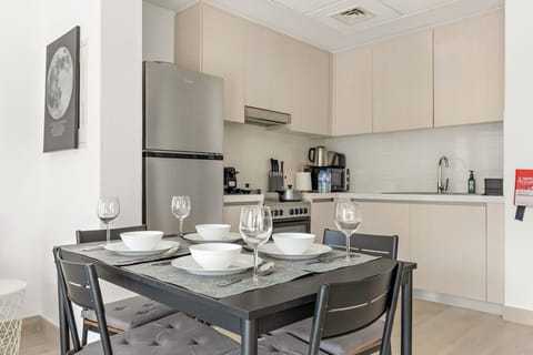Dining Area: Enjoy meals in style with modern decor and fully equipped kitchen amenities!