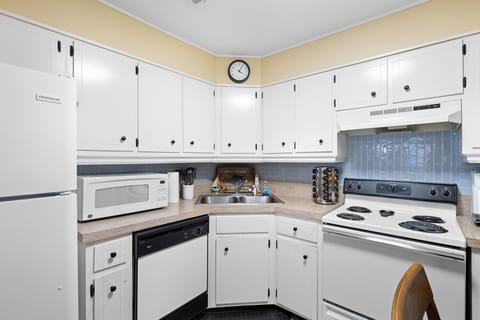 Whip up your favorite meals with ease in this sparkling clean, fully equipped kitchen. With a full-sized stove and oven, ample counter space, and all the essentials.